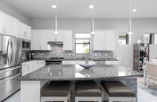 Arborwood House | Open concept, water view in desirable Plantation Somerset Gateway Fort Myers, FL