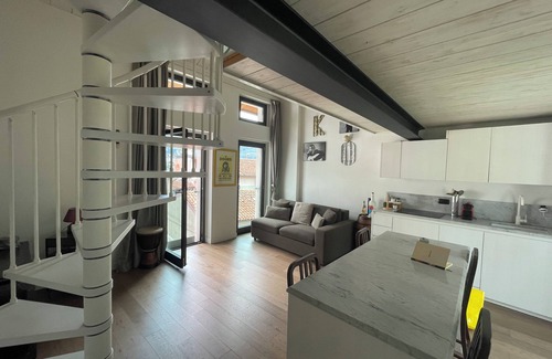 Malgrate Apartment | Open-plan loft overlooking Lake Como with private parking space