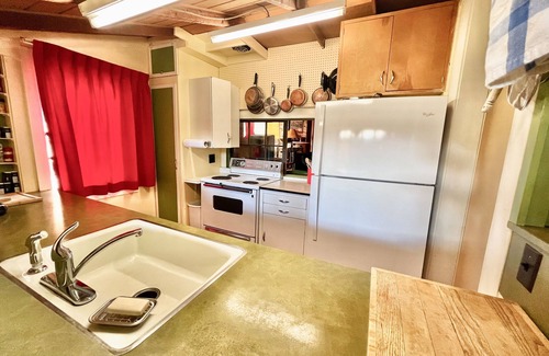 Grand Lake House | Original charmer with expansive waterfront deck, dock, fireplace - walkable area