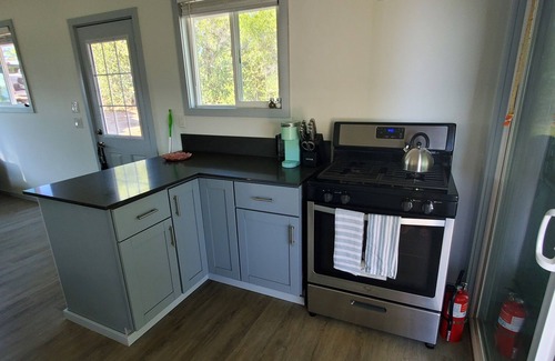 Kohala Estates Cottage | Paddles Too: Cozy Cottage in a quiet neighborhood.