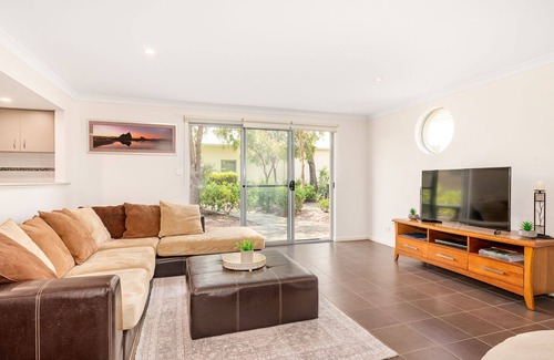 Broadwater Resort | Palm Retreat - Modern, aesthetic, and right by the beach. Perfect for a couples getaway - welcome to