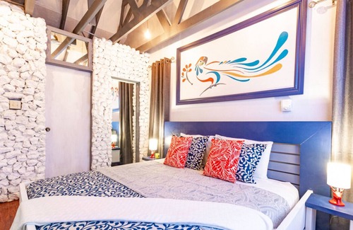 Nassau Cottage | Parrot Cottage at Love Beach Pool