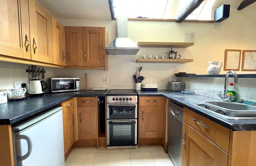 Dunscore House | Pass the Keys | Beautiful 2BR Converted Mill - Idyllic Location