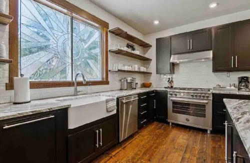 Whitefish Cabin | Peaceful cabin overlooking meadow with hot tub