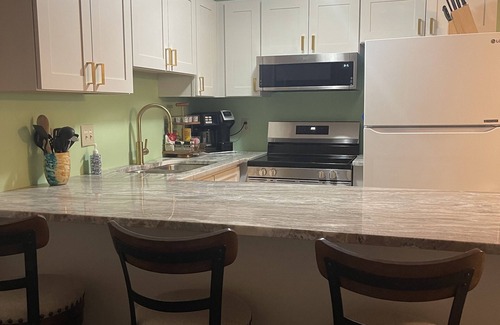 Emerald Isle Condo | Peaceful, Gated community with Indoor & Outdoor Pools.Walk to dining and fun!