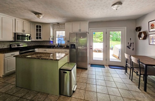 Hendersonville House | Peaceful Hendersonville home with porch, WiFi, fire pit and Keurig!