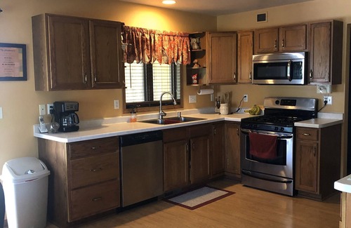 Oshkosh House | Peaceful home, 4 miles from EAA Aviation Center! Easy access. AirVenture Museum.