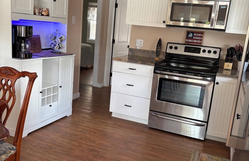 Barnstead House | Peaceful Lakefront Retreat w/Private Beach, Outdoor Bar & Home Theater