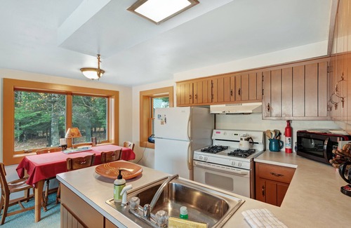 Rhinelander House | Peaceful, quiet lakefront dog-friendly cabin w/fishing dock, boats, campfire pit