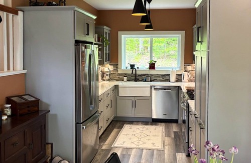 Newfane House | Peaceful riverfront house, dog-friendly, woodstove, decks, bbq, firepit, dock