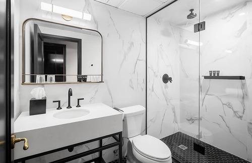 Riverside Hotel | Pet-Friendly Boutique Property in East End! On-Site Coffeehouse, Rooftop Bar