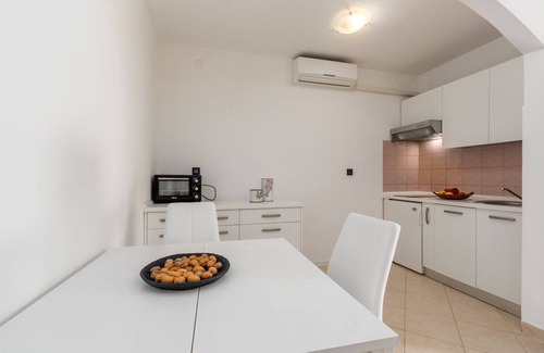 Susnjici Apartment | Picturesque flat with pool, outdoor kitchen, BBQ, sunbeds, children's swing