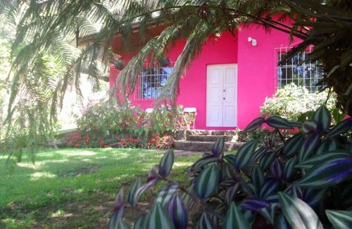 San Lucas Toliman Ski Chalet | Pink house on the lake