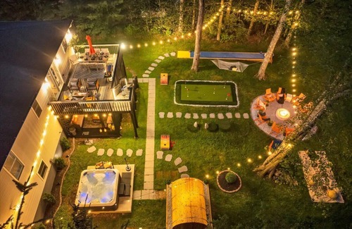Pocono Summit House | Poconos Luxury Sauna Outdoor Movie Hot Tub Bowling Mini Golf