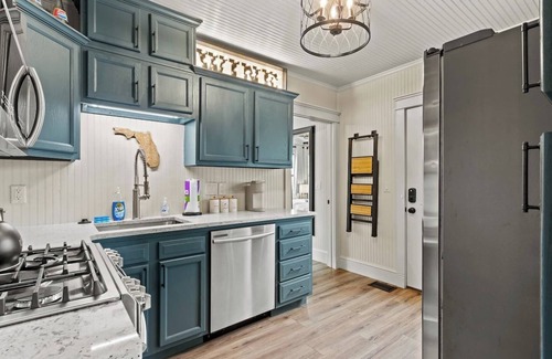 East Pensacola Heights House | Pool Cottage * 2 bedroom * Fireplace * Historic Charm * Designer Finishes