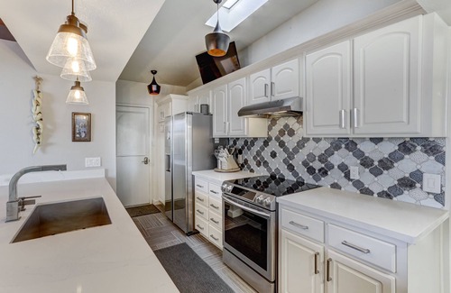 Fountain Hills House | POOL & SPA! Football fans will love the TV Wall! Remodeled mid-century luxury!