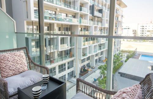Masdar City Apartment | Poolside Charm