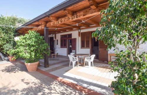 Praia a Mare Apartment | Practical apartment with open terrace and communal pool.