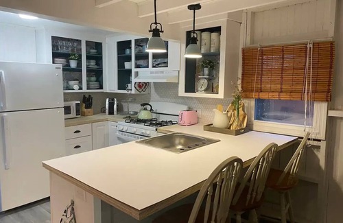 Onset Cottage | Pristine beach cottage just steps from the beach!