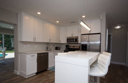 Deerfield Beach House | Private home with private heated pool and huge backyard . Five min to beach .