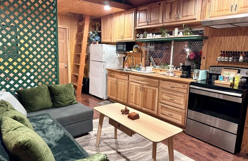 Ryderwood Cabin | Private Romantic Woodland Getaway- with sauna, hot tub, fire pits, and more.