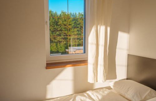 Jeziorany Resort | Przystań Jeziorany - pokoje nad jeziorem