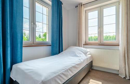 Jeziorany Resort | Przystań Jeziorany - pokoje nad jeziorem