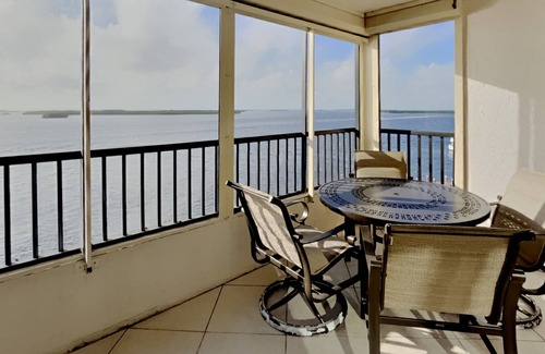 Punta Rassa Condo | Punta Rassa #404 TRANQUIL SPACIOUS 2 BED CONDO WITH GORGEOUS SUNSET WATER VIEWS