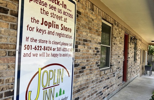Mount Ida Apartment | Queen Guest Room located at the Joplin Inn at the entrance to Mountain Harbor, just 2 1/2 miles from Lake Ouachita. by RedAwning