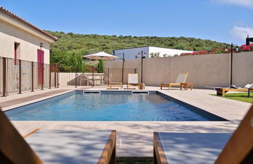 Oletta Villa | Résidence Les volets rouges - Duplex de standing avec piscine