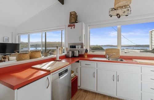 Raglan House | Raglan Beach House , Stunning Ocean and Harbour views out at Ocean Beach