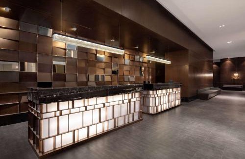 Jingkou District Hotel | Ramada by Wyndham Zhenjiang Dagang New District