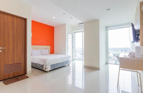 Pekayon Jaya Apartment | RedLiving Apartemen Grand Kamala Lagoon - Rooms 911 Tower Barclay South with Netflix
