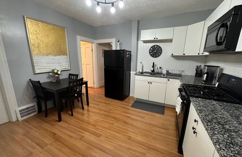 Cleveland House | Relax & Work in Style: 2BR Home with Private Office & Yard