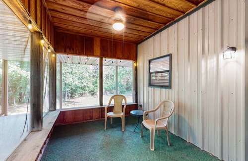Kingston House | Relaxing escape on a large lot with a washer/dryer, sunroom, & firepit