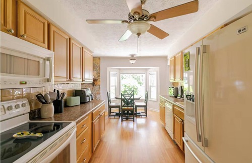 Long Bay Estates House | Relaxing Mediterranean style home w/hot tub, 2 golf carts, private beach access