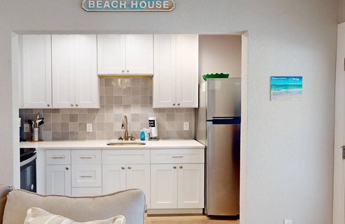Madeira Beach Condo | Remodeled Florida Beach Cottage with Private Patio Area. Relax at the Pool. Walk Over to the Beach.