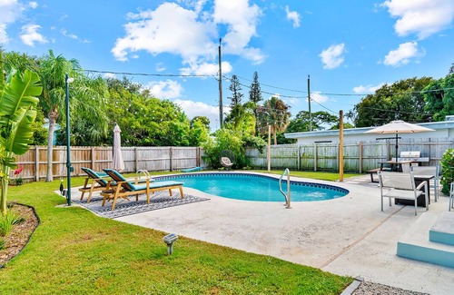 Mango Groves House | Remodeled historic boho-bungalow w/private pool at Lake Worth Beach.