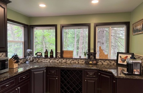 Sandpoint House | Remodeled woodland oasis for those who want it all