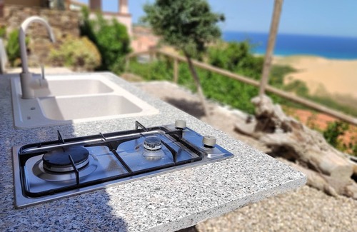 Torre dei Corsari Apartment | Renovated house overlooking dunes and pristine sea.