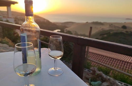 Torre dei Corsari Apartment | Renovated house overlooking dunes and pristine sea.