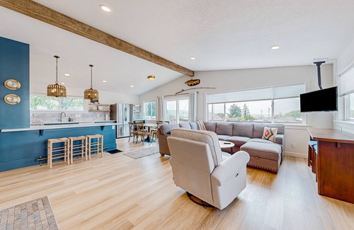 Bay City House | Renovated home with wood stove, water views, & expansive balcony - dog ok