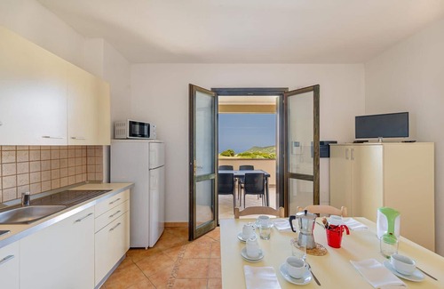 Tergu Apartment | Residenza Le Farfalle 'Two-Room Apartment B' with Garden View, Shared Pool