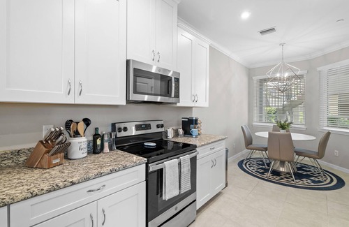 Naples Condo | Resort Living, Professionally Decorated, END Unit,1st Floor, Stunning Water View