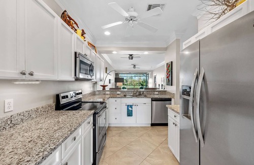 Naples Apartment | Resort Pool, Golfing and Pickleball all steps away from our beautiful condo