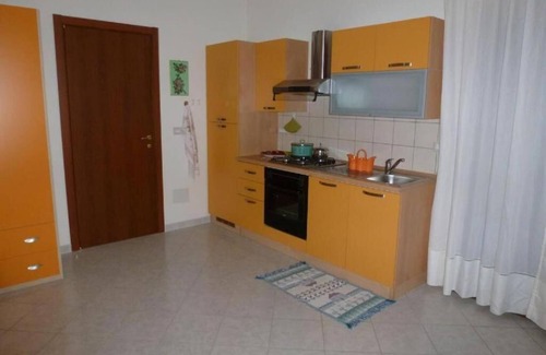 Iglesias Historic Centre Apartment | Rilassati nella Nostra Suite Rosa: Un Ambiente Familiare Vicino al Centro