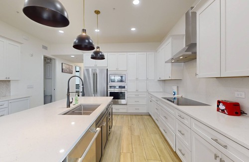 Melbourne Beach Condo | River view retreat with on-site pool, hot tub, & dock plus washer/dryer, & AC