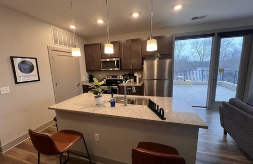 Indianapolis Apartment | River Views & Monon Trail Steps Away: Chic Oasis