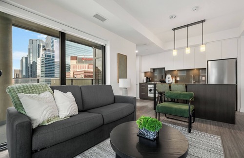 Eau Claire Apartment | River Views w XL Patio, Parking, Office, 2BR