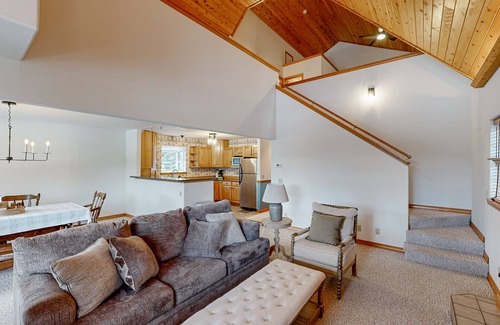 Sandpoint Cabin | Riverfront home with mountain view, hot tub, deck, WiFi, W/D, & fireplace